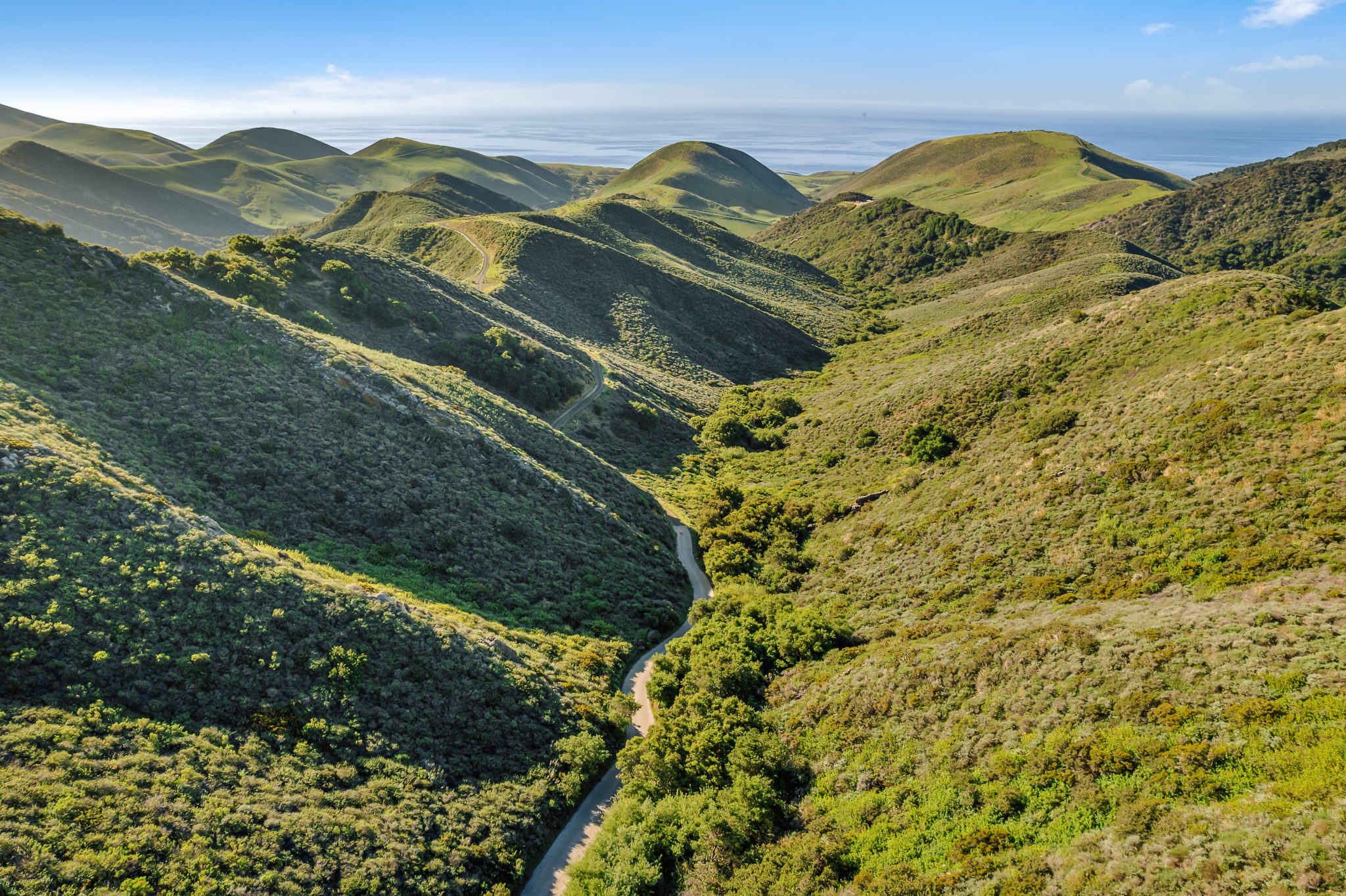 green hills and blue ocean in hollister ranch
